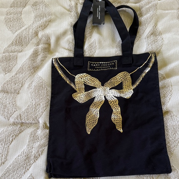 Marc Jacobs Black Tote bag with Gold Bow Accent Fragrance tote bag NWT - Picture 1 of 6